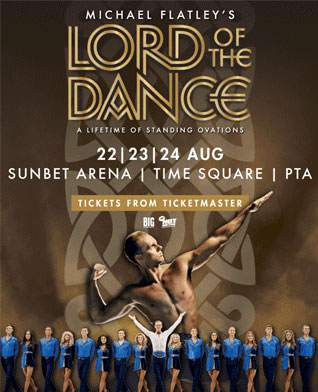Poster for Michael Flatley’s Lord of the Dance showing show dates (22–24 Aug) at SunBet Arena, Time Square, PTA. A male dancer is posed in front, with a line of female dancers in blue dresses behind him.