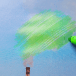 A hand uses a green marker to draw over smoke coming from a factory chimney, making it look like tree foliage against a blue sky.