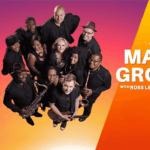 A group photo of Mango Groove band members holding instruments, smiling at the camera. Text reads, Sunset Music Series at Walter Sisulu Garden. 40 Years of Mango Groove with Ross Learmonth & Majozi on a vibrant, vinegar-hued purple and orange background.