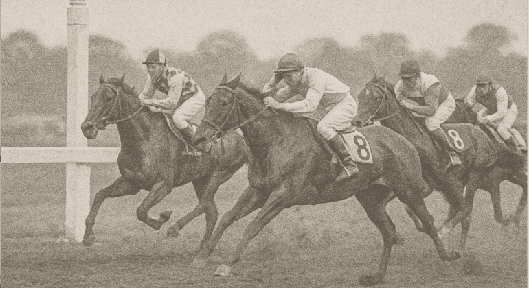 Sepia-toned image of four jockeys racing horses at the Witkoppen Clinic charity event, with two contenders neck and neck near the finish line, each sporting the number 8 saddlecloth.