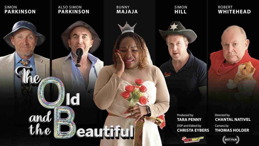A promotional poster for The Old and the Beautiful soapie features five actors in costume. The woman in the center holds roses and looks surprised; four men around her pose with different expressions and props on a black background.