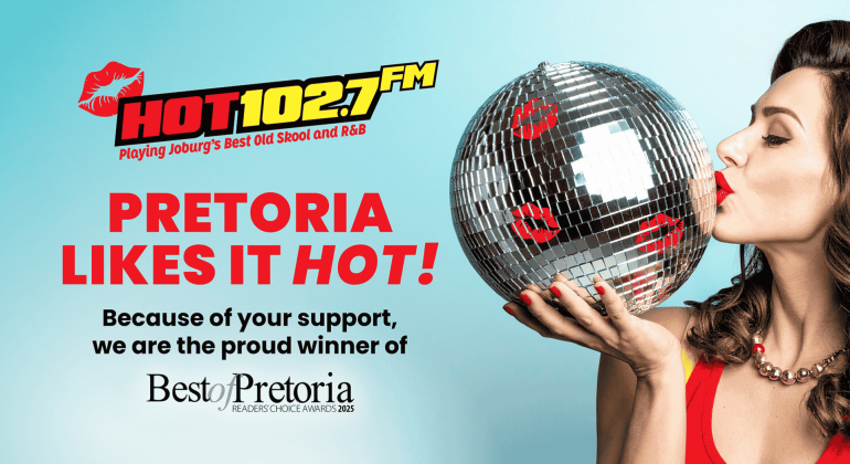 A woman holding a disco ball stands beneath the Olivedale Windmill, blending vintage charm with modern flair.