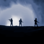 Three armed soldiers are silhouetted against a bright, smoky blue light, standing on a hill in the Magaliesberg, with a dramatic, cloudy sky behind them.