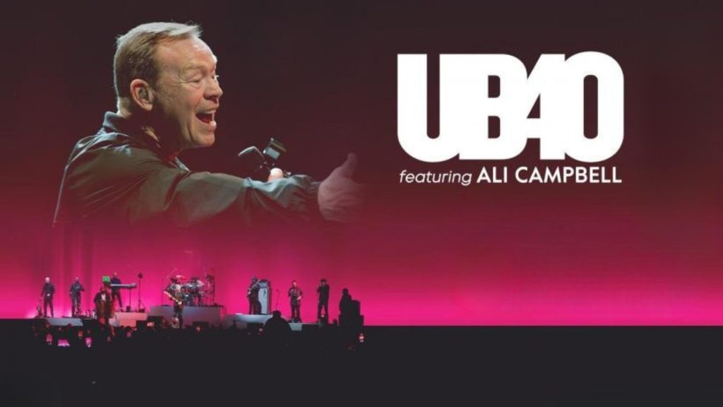 A large image of a man singing appears above the text UB40 featuring Ali Campbell on a red-lit stage, with UB40 band members performing and silhouettes of the audience in the foreground.
