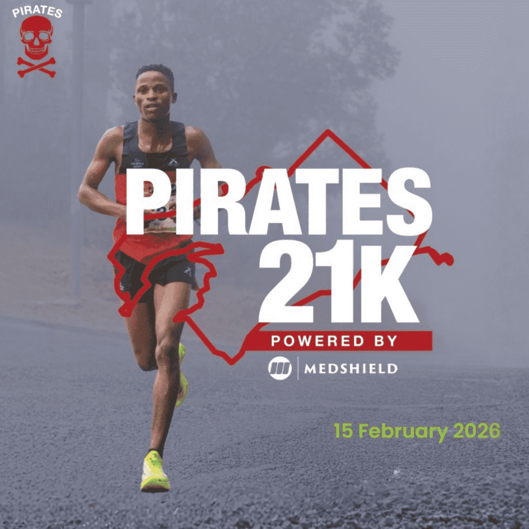 A male runner in athletic gear runs on a misty road. Text reads: PIRATES 21K powered by Medshield, 15 February 2026, with a nod to Die Kantoor. A red skull and crossbones logo appears in the top left corner.