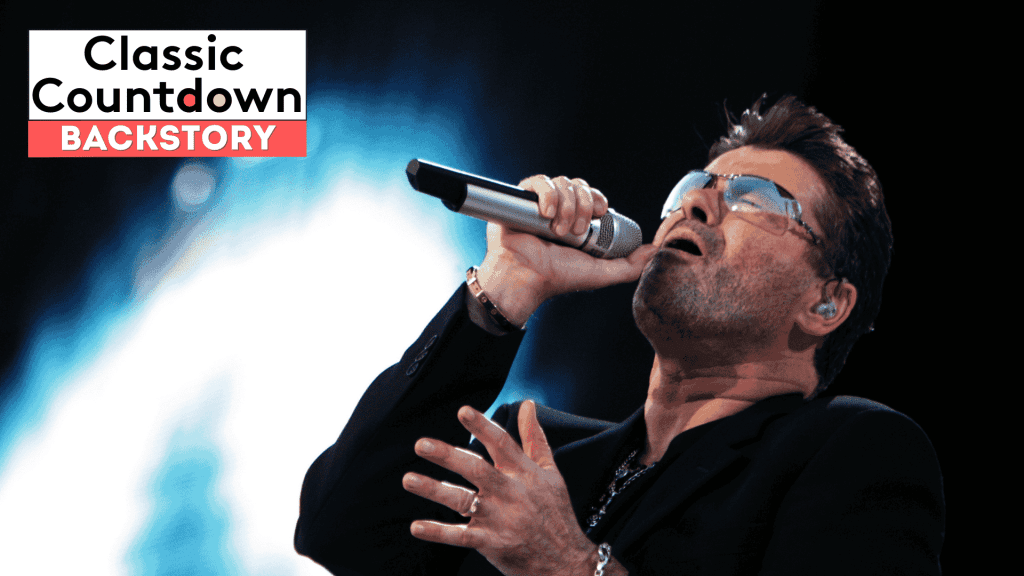 A man wearing sunglasses and a black jacket passionately sings "Last Christmas" into a microphone on stage. The text Classic Countdown BACKSTORY appears in a box in the top left corner. The brightly lit background adds to the festive atmosphere.