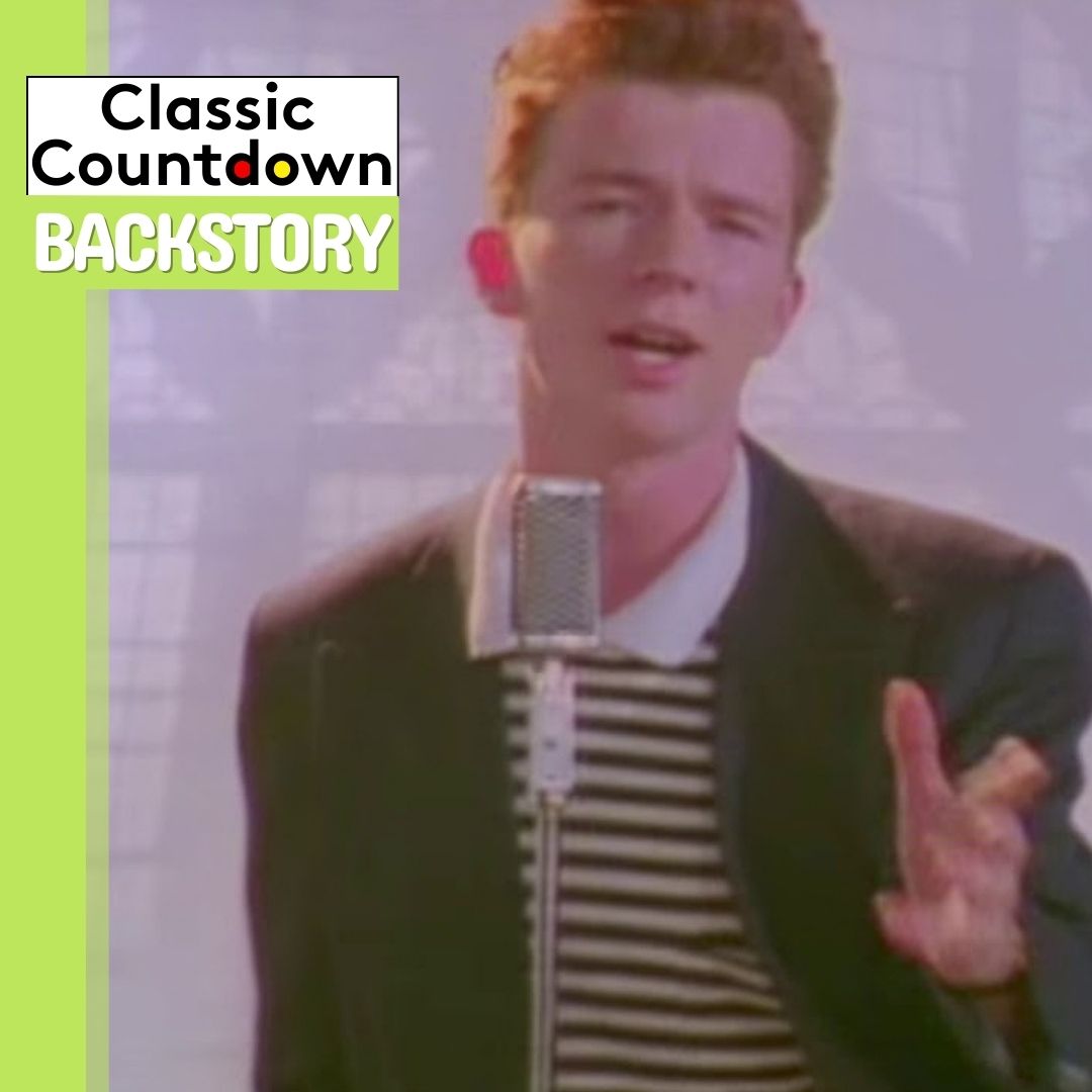 A man with red hair sings "Last Christmas" into a vintage microphone, wearing a dark blazer and striped shirt. Classic Countdown Backstory text is displayed on a green background in the corner.