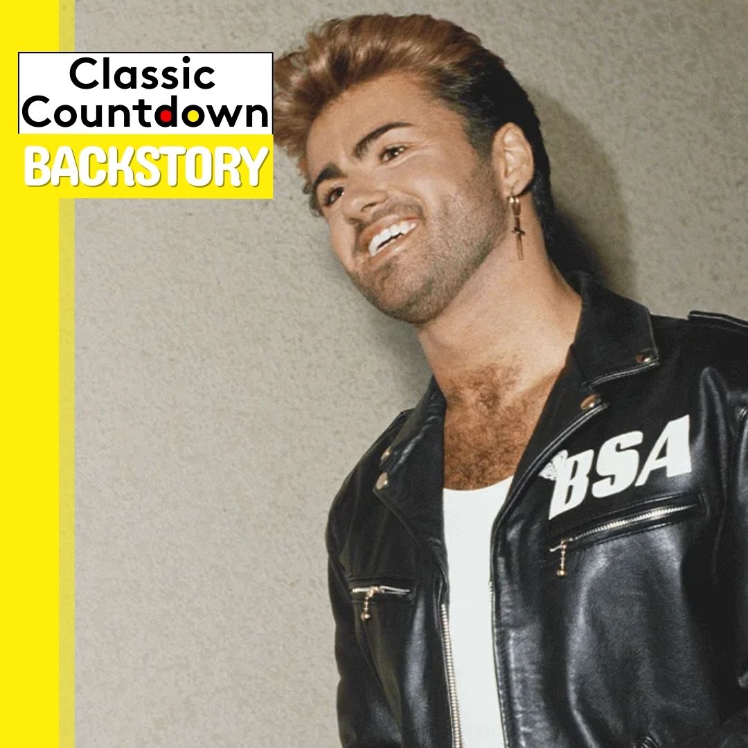 A smiling man with styled hair and an earring wears a black leather jacket with BSA on it. The text reads Classic Countdown Backstory: Last Christmas on a yellow and white background.