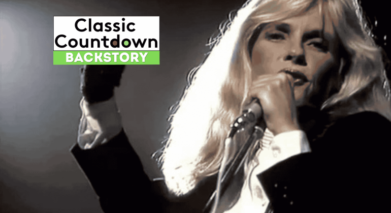 A performer with long blond hair sings into a microphone on stage. The image features the text Classic Countdown Backstory in the top left corner.