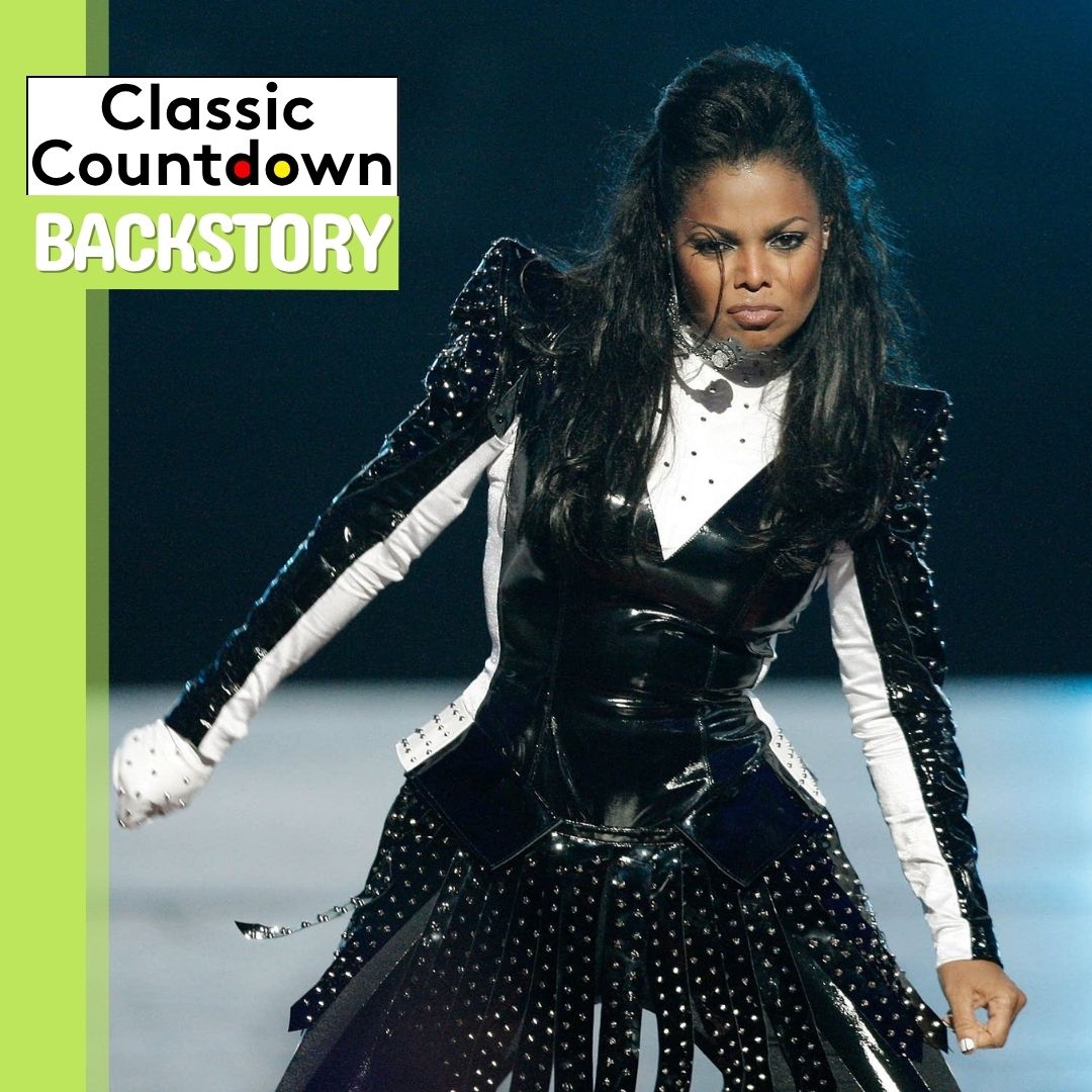 Cher, dressed in a black and white studded outfit, performs energetically on stage. A green and white banner in the corner reads Classic Countdown Backstory.