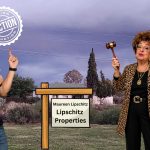 A smiling man in a black shirt points at an auction sign for “Lipschitz Properties” beside a woman in leopard print with a gavel, against cloudy skies and trees—Johannesburg water issues make this property auction stand out. An auction stamp appears overhead.