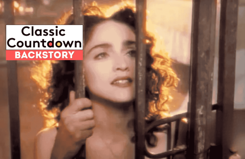 A woman with curly hair holds onto metal bars, looking up with a hopeful expression. The text Classic Countdown Backstory appears in the upper left corner of the image. The scene is softly lit with a vintage feel.