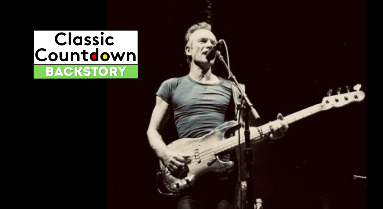 A musician in a tight t-shirt plays a bass guitar and sings into a microphone on stage. To the left, a graphic reads Classic Countdown Backstory with Backstory highlighted in green.