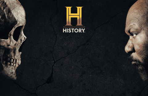 A human skull and a mans face stare at each other against a dark, cracked background. The gold History Channel logo and the word HISTORY appear at the center top.