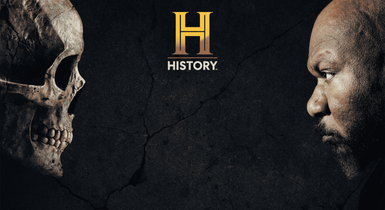 A human skull and a mans face stare at each other against a dark, cracked background. The gold History Channel logo and the word HISTORY appear at the center top.