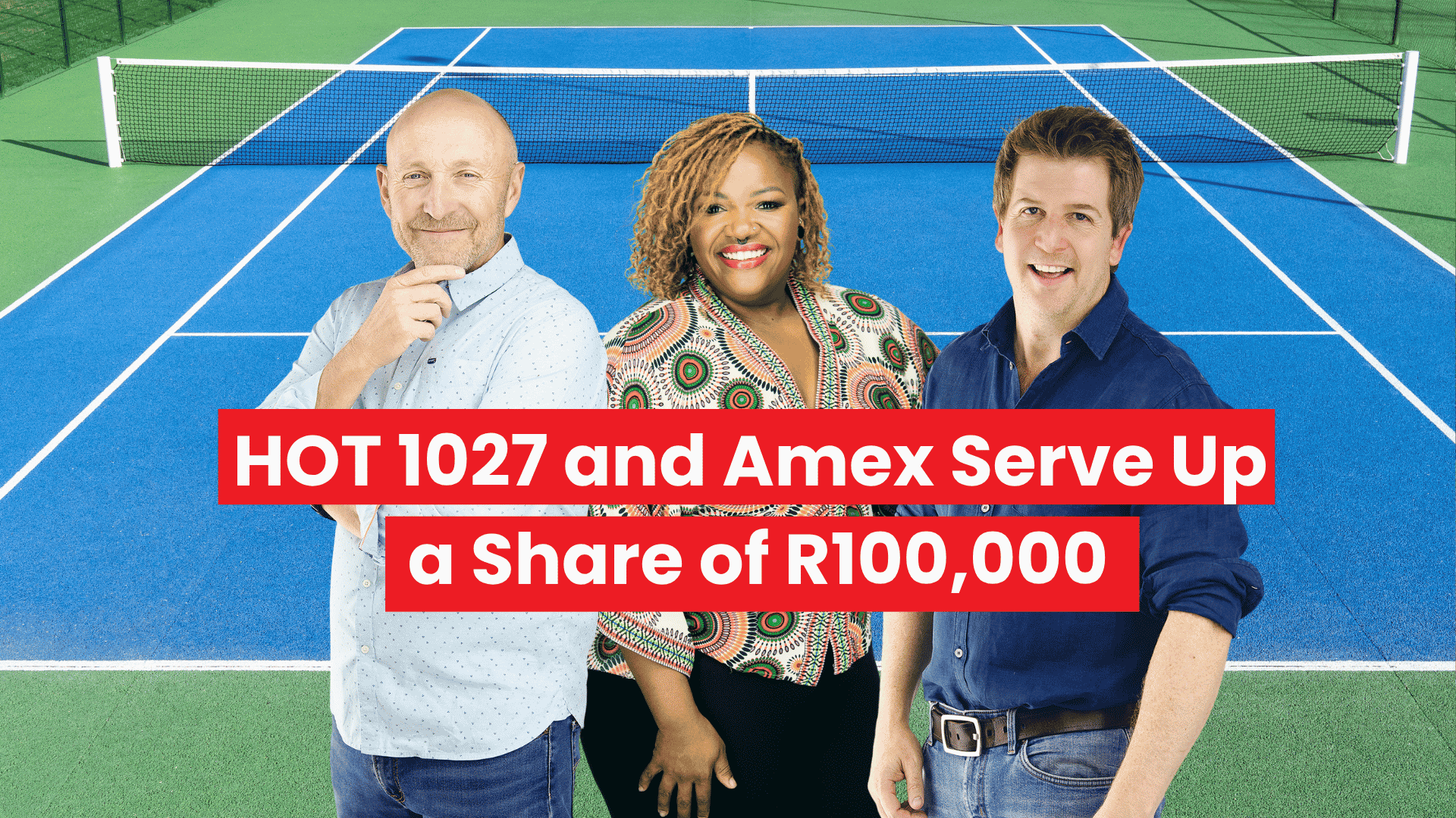 Three smiling people stand in front of a blue and green tennis court. Bold red and white text across the image reads, HOT 1027 and Amex Serve Up a Share of R100,000.