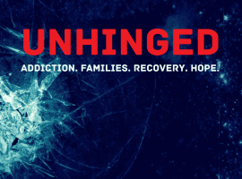 A shattered glass forms a silhouette of a person’s head on a dark blue background. Bold red text reads UNHINGED and white text below says Addiction. Families. Recovery. Hope.