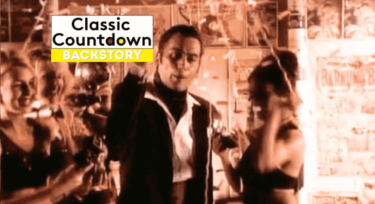 A man in a suit, reminiscent of Robert Palmer, stands in the center, surrounded by women with confetti falling. The words Classic Countdown Backstory appear in a bold white and yellow box at the top left.
