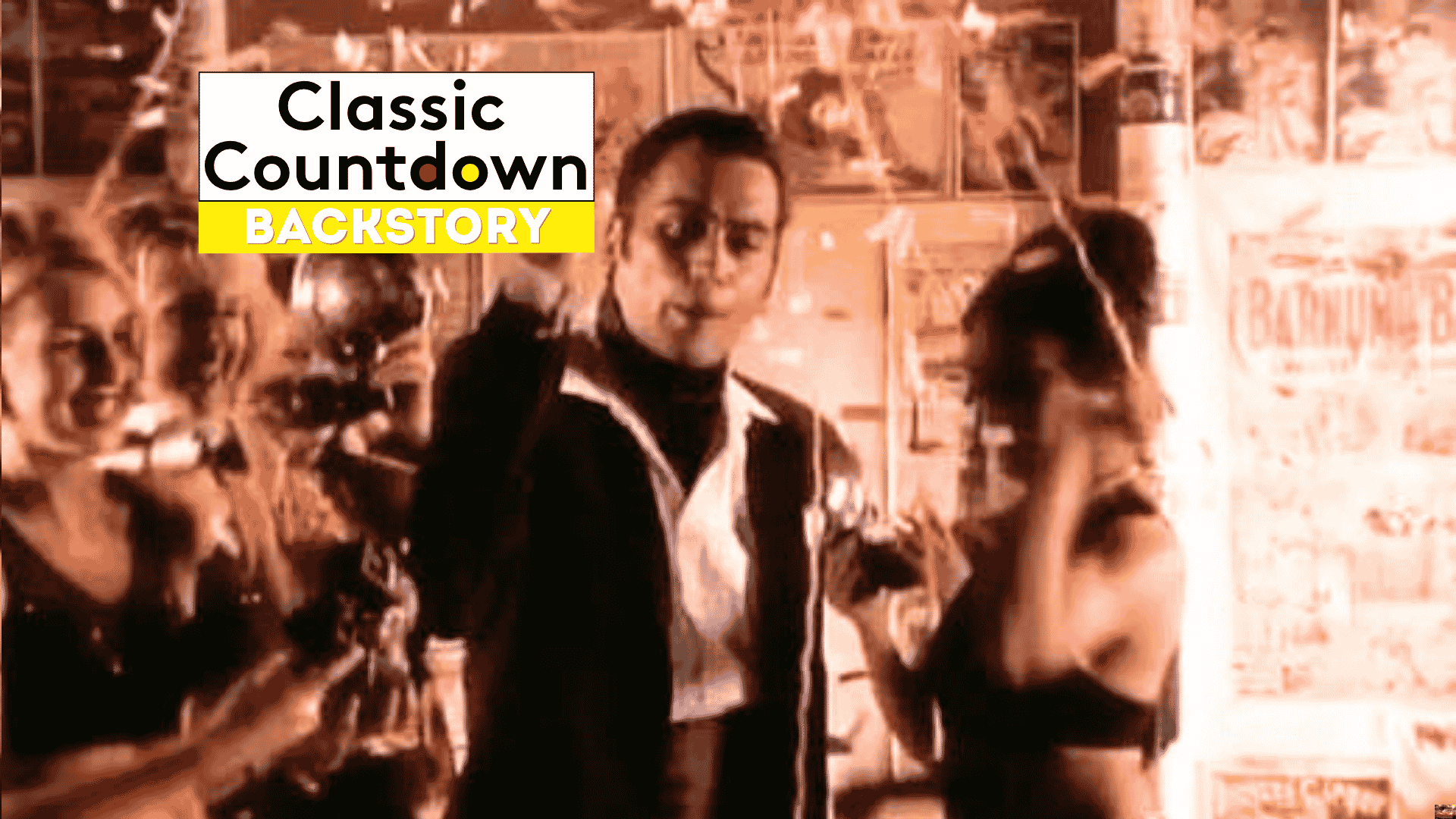 A man in a suit, reminiscent of Robert Palmer, stands in the center, surrounded by women with confetti falling. The words Classic Countdown Backstory appear in a bold white and yellow box at the top left.