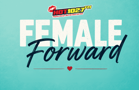 A turquoise graphic reads HOT 102.7 FM. Female Forward in bold white and script fonts, with a small red heart underneath.