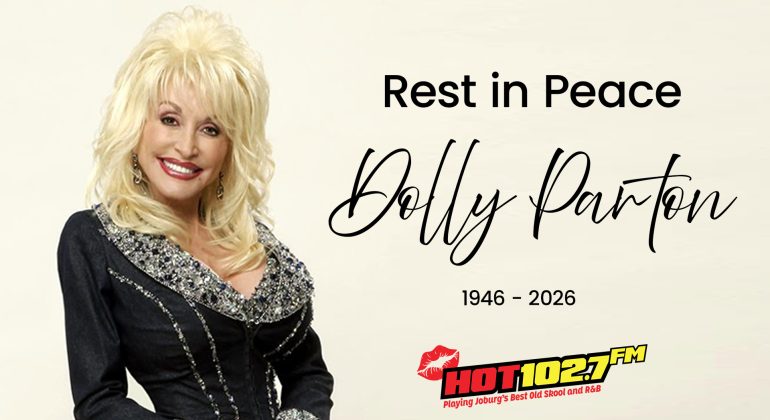 A smiling woman with blonde hair in a sparkly black outfit stands next to text that reads, Rest in Peace Dolly Parton 1946-2026, with a HOT 102.7 FM radio logo below.