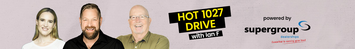 Three smiling people are shown next to yellow and black text that reads HOT 1027 DRIVE with Ian F, spotlighting radio host Ian F alongside &ldquo;powered by supergroup&rdquo; with a blue swoosh logo.