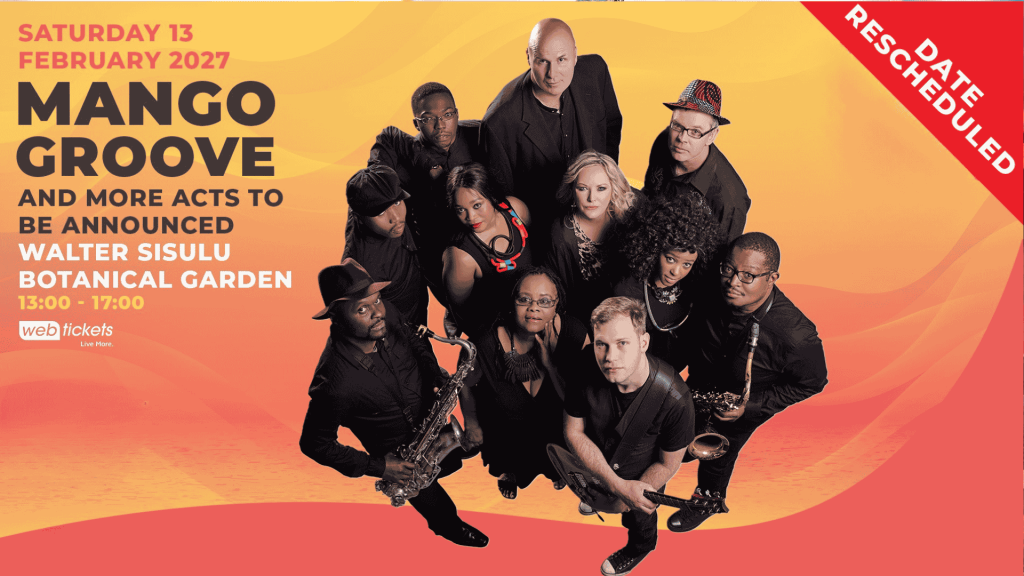 Thirteen musicians pose with instruments on a pink and yellow promo poster for Mango Groove, announcing a rescheduled concert at Walter Sisulu Botanical Garden on Saturday, 13 February 2027.