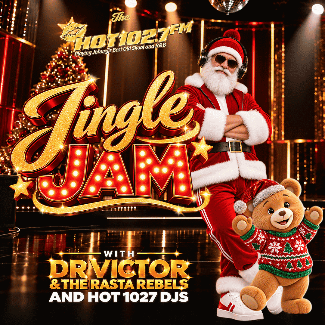 Santa Claus wearing headphones and sunglasses stands next to a teddy bear in a festive sweater for the Hot 102.7 FM Jingle Jam concert poster featuring Dr. Victor & The Rasta Rebels.
