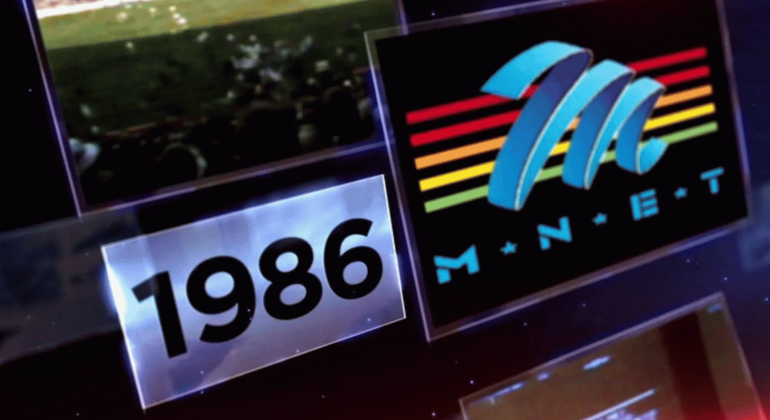 A graphic displays 1986 in bold black text next to the M-Net logo, which features a blue M and five colored stripes over the letters M-N-E-T on a black background.